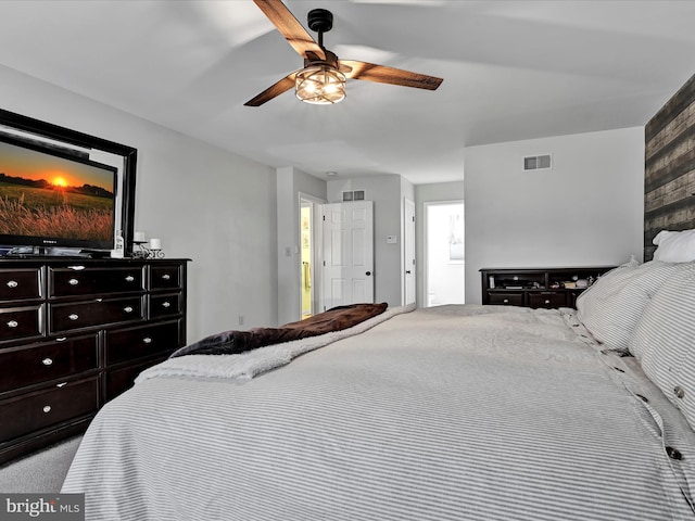 bedroom featuring visible vents and a ceiling fan