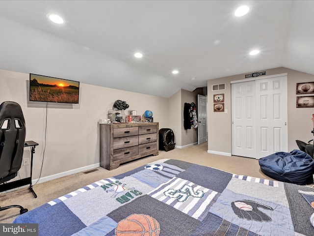 bedroom with lofted ceiling, recessed lighting, and light colored carpet