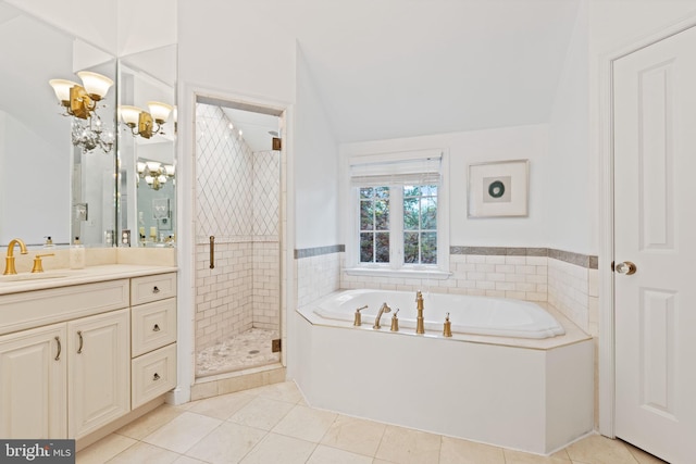 506 Ivy Cir, Alexandria, VA 22302 - bathroom featuring a bath, a stall shower, vanity, and tile patterned flooring