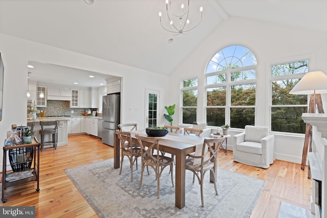 506 Ivy Cir, Alexandria, VA 22302 - dining area featuring high vaulted ceiling, beamed ceiling, an inviting chandelier, recessed lighting, and light wood finished floors