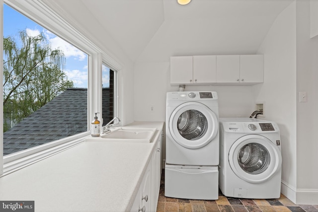 506 Ivy Cir, Alexandria, VA 22302 - laundry room with stone finish floor, washing machine and dryer, a sink, and cabinet space