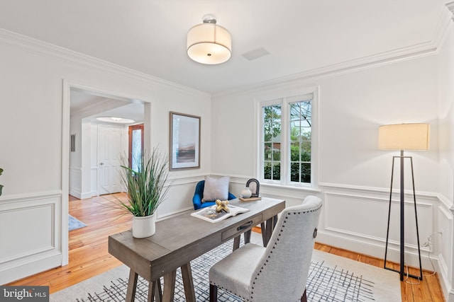 506 Ivy Cir, Alexandria, VA 22302 - home office with light wood-style flooring, ornamental molding, and a wainscoted wall