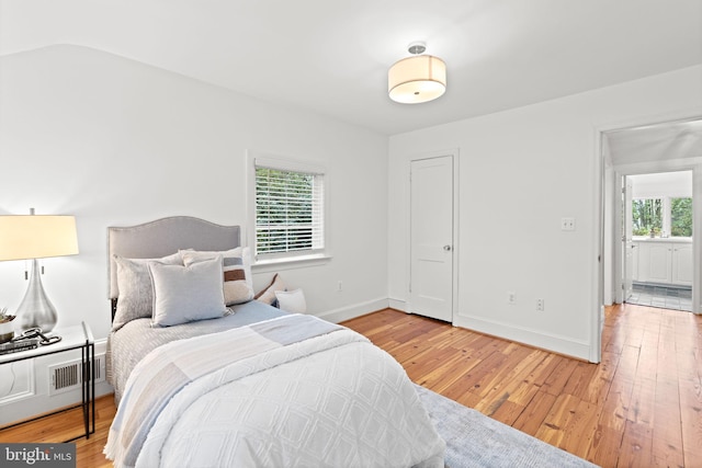 506 Ivy Cir, Alexandria, VA 22302 - bedroom with light wood-type flooring, baseboards, and visible vents