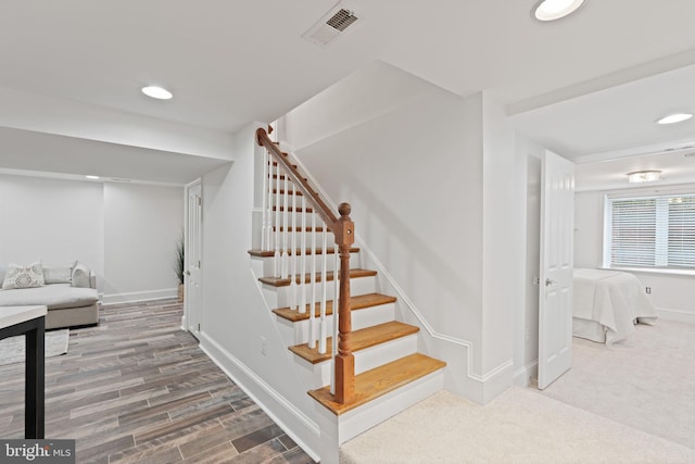506 Ivy Cir, Alexandria, VA 22302 - stairway with wood finished floors, baseboards, visible vents, and recessed lighting