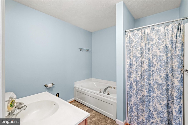 bathroom featuring a textured ceiling, a shower with shower curtain, a sink, and a garden tub