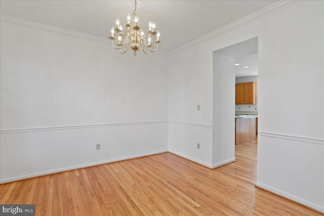 461 Apple Cross Rd, Harpers Ferry, WV 25425 - spare room featuring an inviting chandelier, crown molding, light wood-style floors, and baseboards