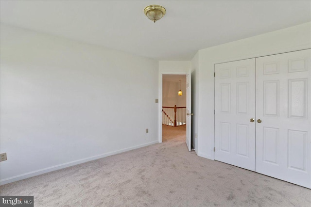 461 Apple Cross Rd, Harpers Ferry, WV 25425 - unfurnished bedroom featuring baseboards, carpet floors, and a closet
