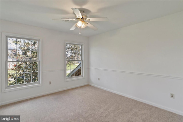 461 Apple Cross Rd, Harpers Ferry, WV 25425 - spare room featuring light carpet, a ceiling fan, and baseboards