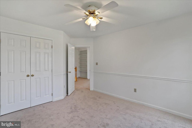 461 Apple Cross Rd, Harpers Ferry, WV 25425 - unfurnished bedroom with a ceiling fan, baseboards, carpet, and a closet