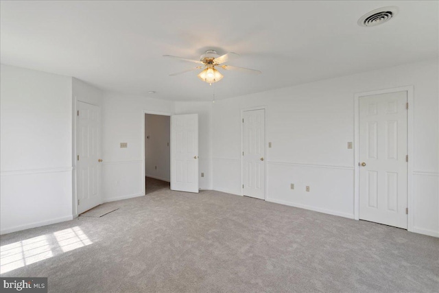 461 Apple Cross Rd, Harpers Ferry, WV 25425 - unfurnished bedroom featuring carpet floors, visible vents, baseboards, and ceiling fan
