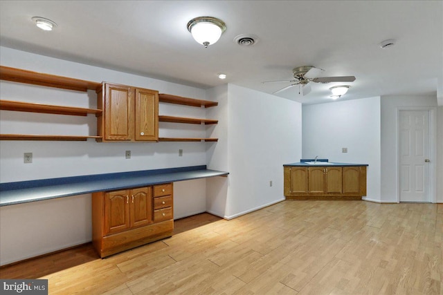 461 Apple Cross Rd, Harpers Ferry, WV 25425 - kitchen featuring a sink, built in desk, visible vents, ceiling fan, and open shelves