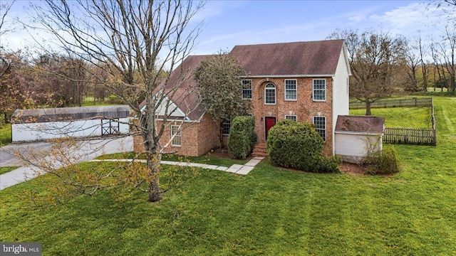 461 Apple Cross Rd, Harpers Ferry, WV 25425 - view of front of property with brick siding, a front lawn, and fence