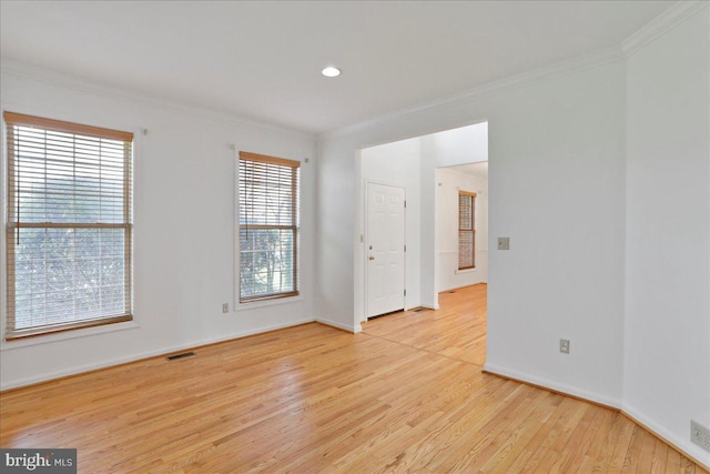 461 Apple Cross Rd, Harpers Ferry, WV 25425 - empty room featuring baseboards, crown molding, light wood-style floors, and visible vents