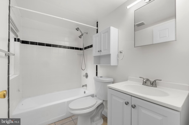 bathroom with vanity, toilet, tile patterned floors,  shower combination, and visible vents