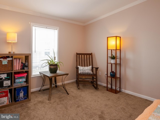 sitting room with carpet floors, baseboards, and ornamental molding