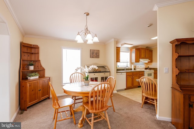 dining space featuring light carpet, baseboards, ornamental molding, and a notable chandelier