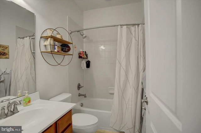 bathroom with toilet, shower / bath combination with curtain, and vanity