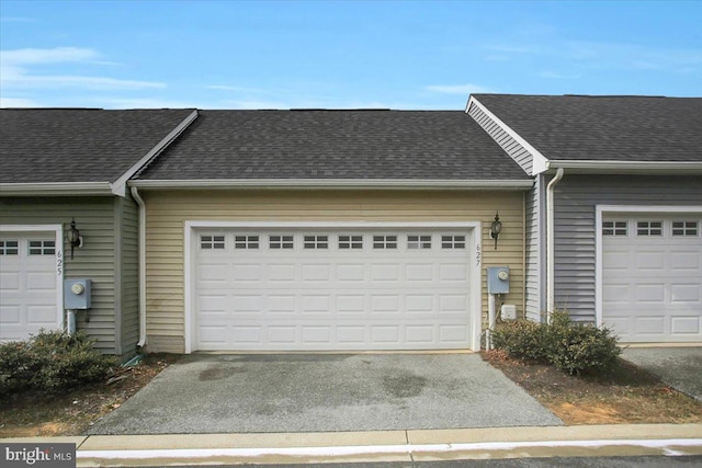 garage with driveway