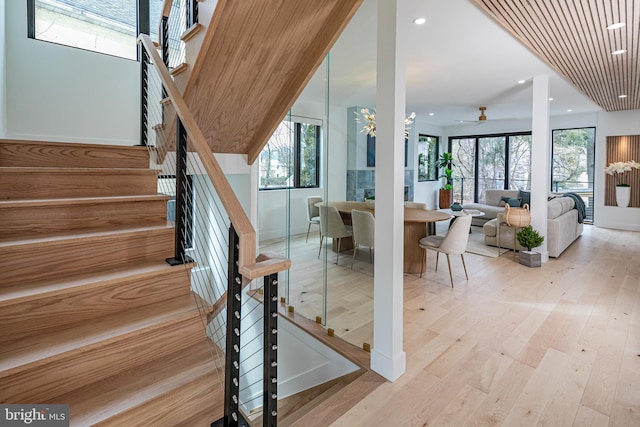 interior space featuring a wealth of natural light, wood finished floors, and recessed lighting