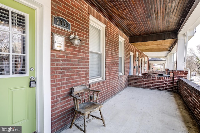 view of patio featuring a porch