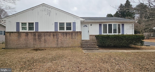 ranch-style home with brick siding