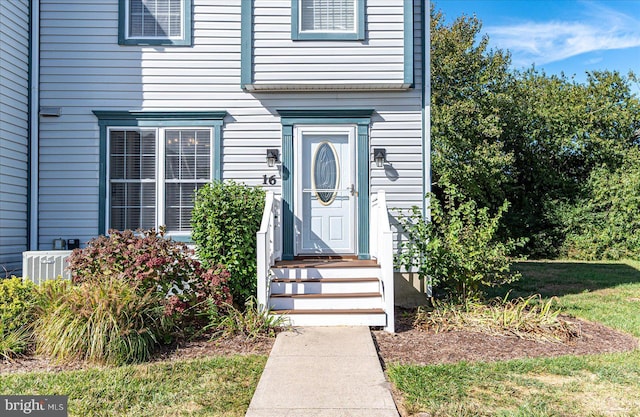 property entrance with cooling unit