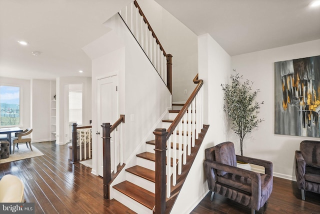 stairs featuring recessed lighting, baseboards, and wood finished floors