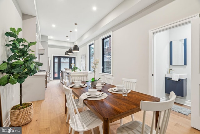 dining room featuring recessed lighting and light wood-style floors