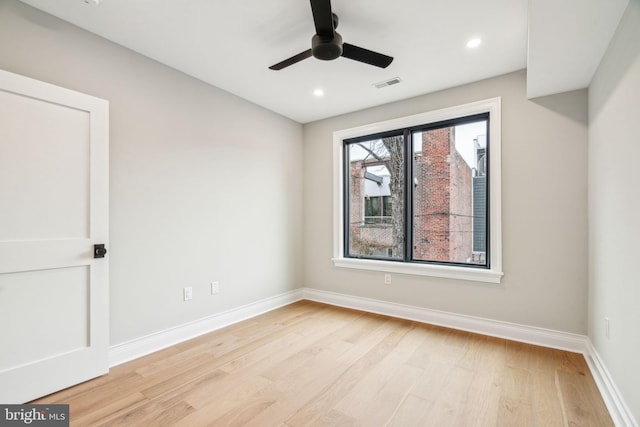 unfurnished room with visible vents, baseboards, a ceiling fan, light wood-style flooring, and recessed lighting