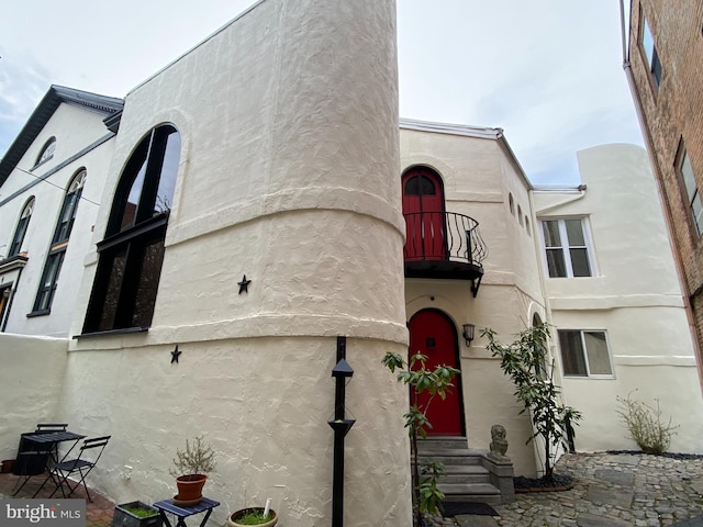 view of front of house featuring stucco siding