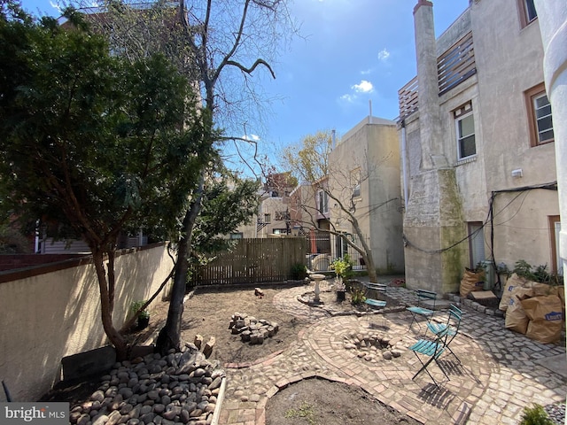 view of yard featuring a patio and fence