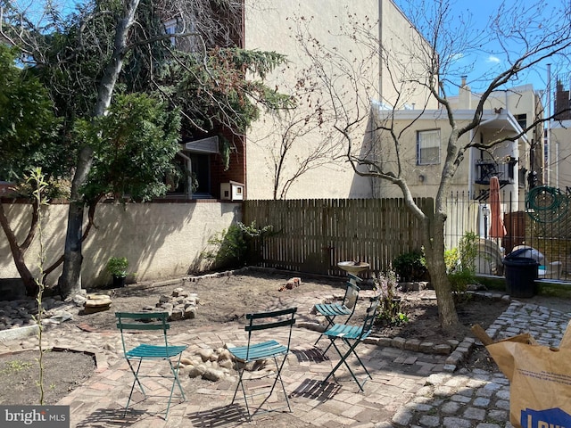 view of patio / terrace with fence