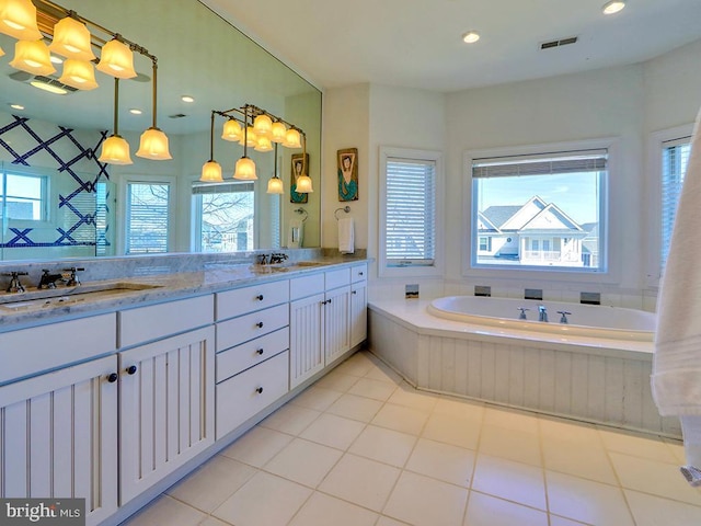 full bathroom with visible vents, a sink, and recessed lighting