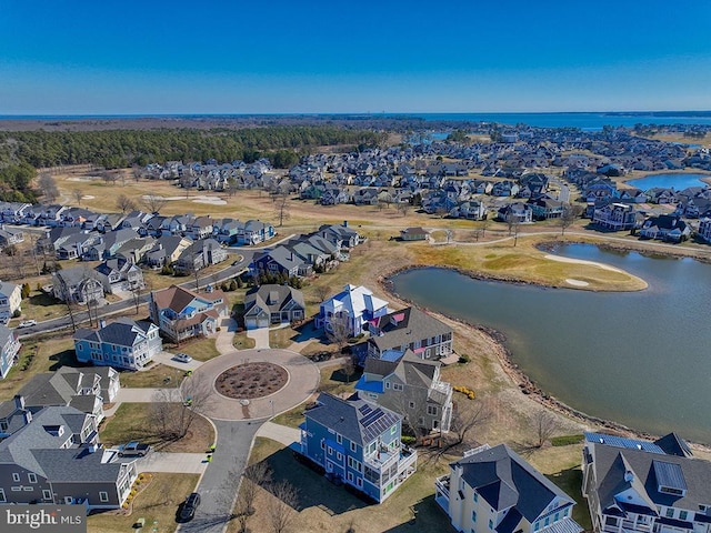 bird's eye view with a water view and a residential view