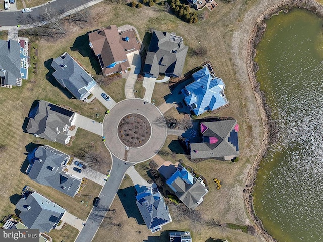 aerial view with a water view and a residential view