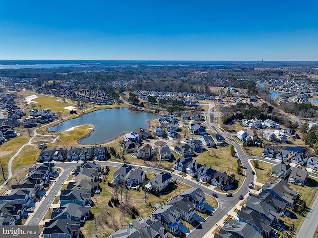 aerial view featuring a water view and a residential view