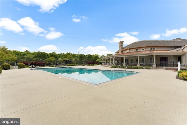 pool with a patio area