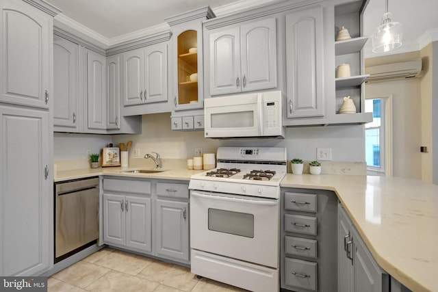 kitchen with white appliances, a wall mounted air conditioner, gray cabinets, open shelves, and a sink