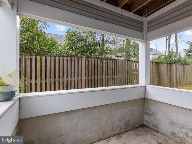 view of patio / terrace featuring fence