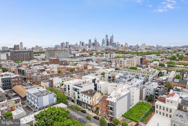 drone / aerial view featuring a city view