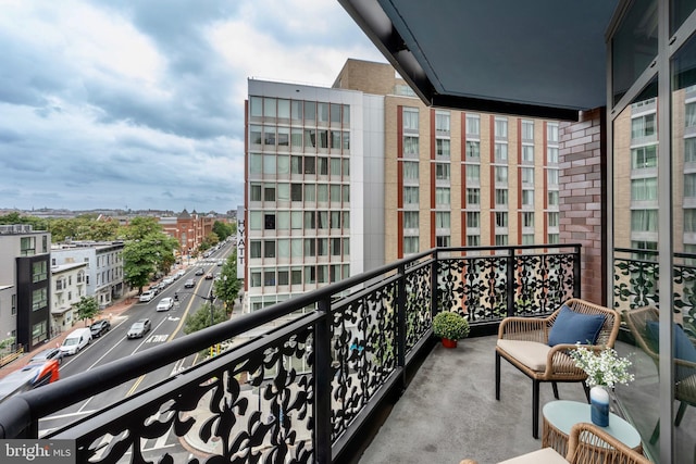 balcony featuring a city view