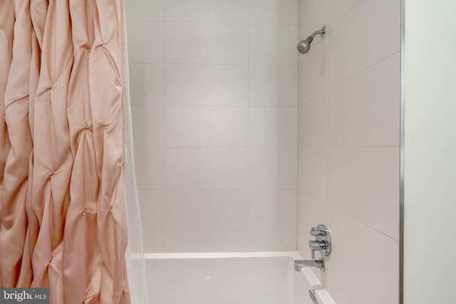 full bathroom featuring shower / bath combination with curtain