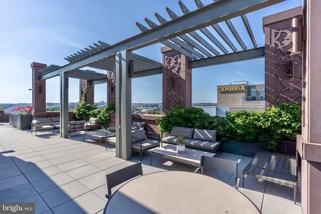 view of patio with an outdoor hangout area, a pergola, and outdoor dining space