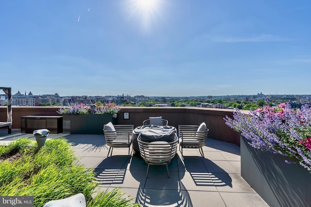 view of patio / terrace with a city view