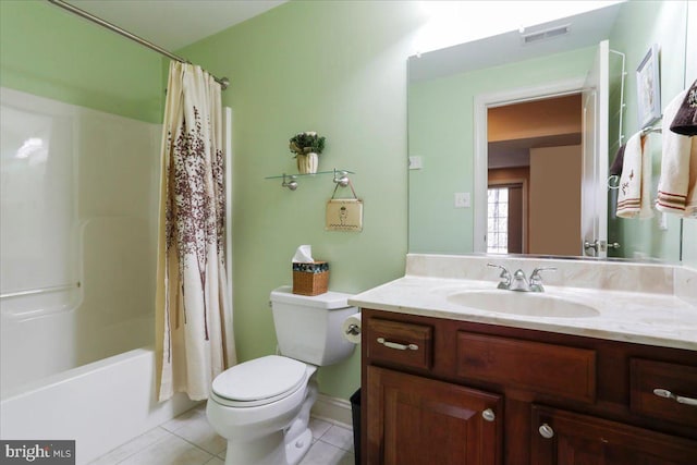 bathroom with tile patterned flooring, toilet, vanity, visible vents, and shower / bath combination with curtain