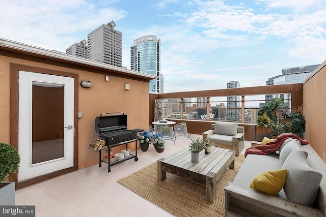 balcony with a view of city and outdoor lounge area