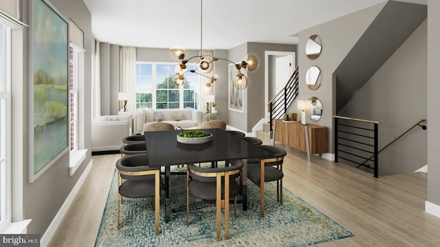 dining space with baseboards, stairway, wood finished floors, and an inviting chandelier