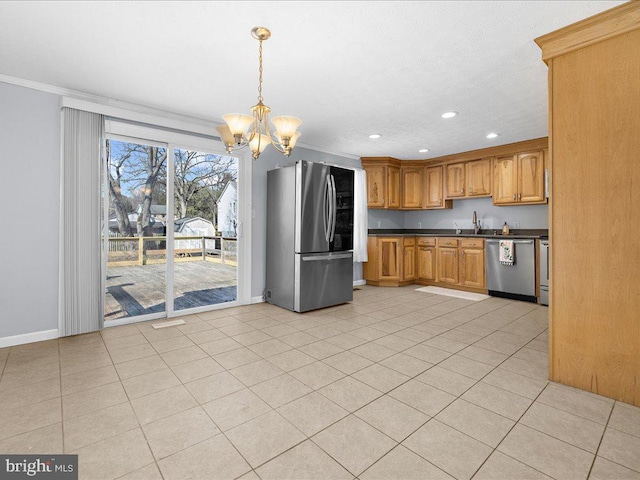 kitchen featuring dark countertops, appliances with stainless steel finishes, light tile patterned flooring, and crown molding