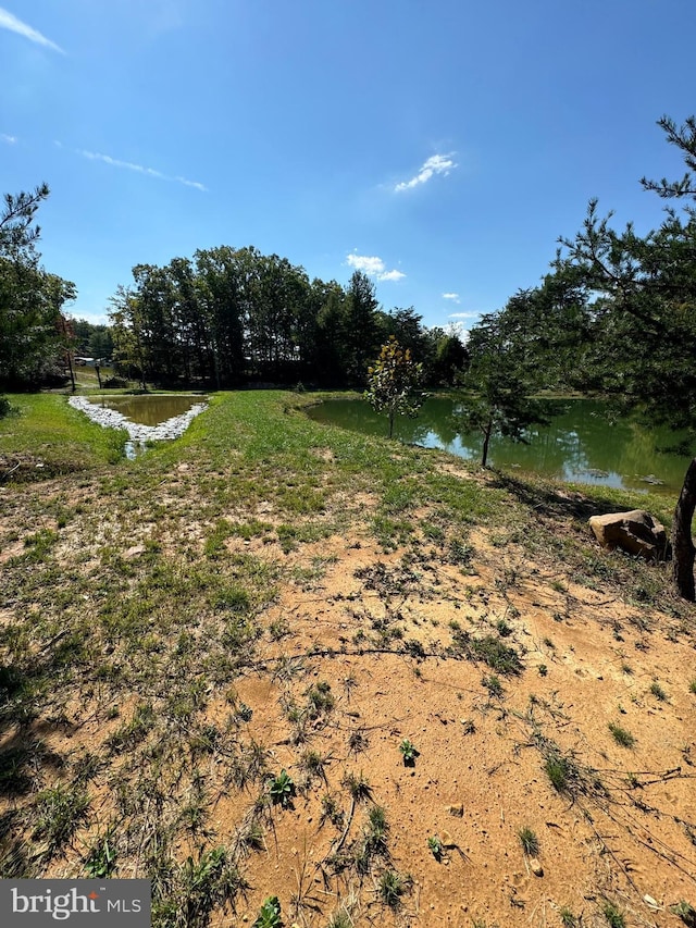 view of yard with a water view