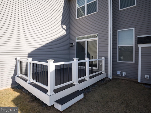 entrance to property featuring a deck